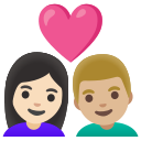 Google (Android 12L)  👩🏻‍❤️‍👨🏼  Couple With Heart: Woman, Man, Light Skin Tone, Medium-light Skin Tone Emoji